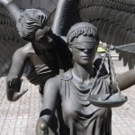 Blind Justice and the Angel of Mercy